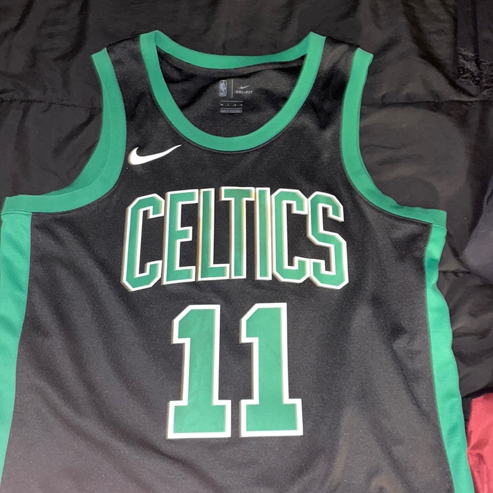 Nike Celtics Kyrie Irving Jersey size Large. Pet and smoke free home. Used 2-3x